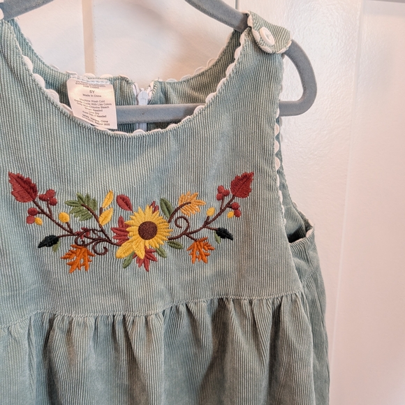 Girls Green Corduroy Jumper  Dress With Embroidered Sunflower Leaf Floral Design - Picture 6 of 8